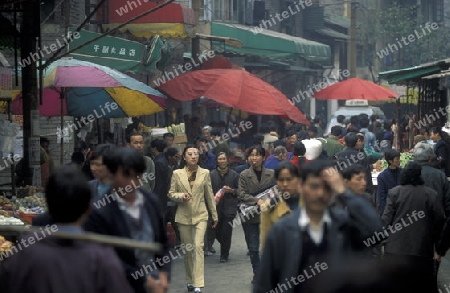 Transport people at the main square in the city of Chongqing in the province of Sichuan in china in east asia. 