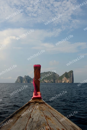 a Boat on the way to Maya Beach  near the Ko Phi Phi Island outside of the City of Krabi on the Andaman Sea in the south of Thailand. 