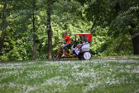 People in a Parc in the old City of Vilnius in the Baltic State of Lithuania,  