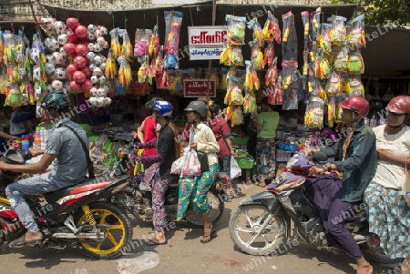 a shop at a marketstreet in the City of Mandalay in Myanmar in Southeastasia.