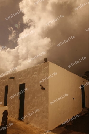 a traditional withe House on the Island of Lanzarote on the Canary Islands of Spain in the Atlantic Ocean.
