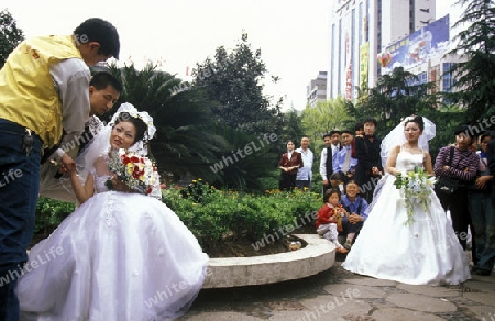 a wedding in the city of wushan on the yangzee river near the three gorges valley up of the three gorges dam project in the province of hubei in china.