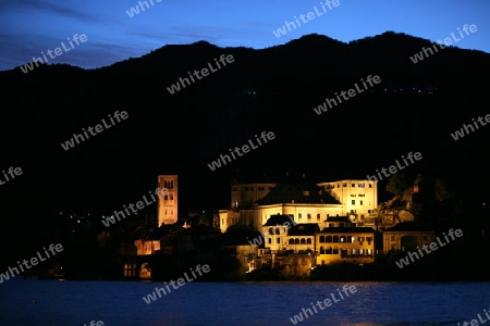 The Isla San Giulio in the Ortasee outside of the Fishingvillage of Orta on the Lake Orta in the Lombardia  in north Italy. 