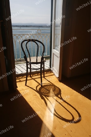 a Balcony an the seaside in the old Town of Siracusa in Sicily in south Italy in Europe.