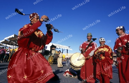 Traditional Music player at the Djemma del Fna Square in the old town of Marrakesh in Morocco in North Africa.
