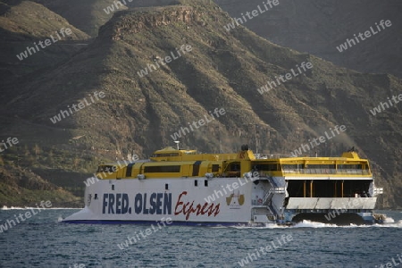 the Ferry Fred Olsen at the Village of Puerto de las Nieves on the Canary Island of Spain in the Atlantic ocean.