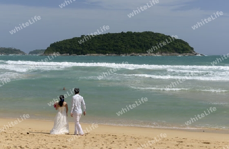 Ein Strand in Hat Nai Harn im sueden der Insel Phuket im sueden von Thailand in Suedostasien.