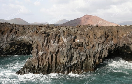 the Landscape of El Golfo on the Island of Lanzarote on the Canary Islands of Spain in the Atlantic Ocean. on the Island of Lanzarote on the Canary Islands of Spain in the Atlantic Ocean.
